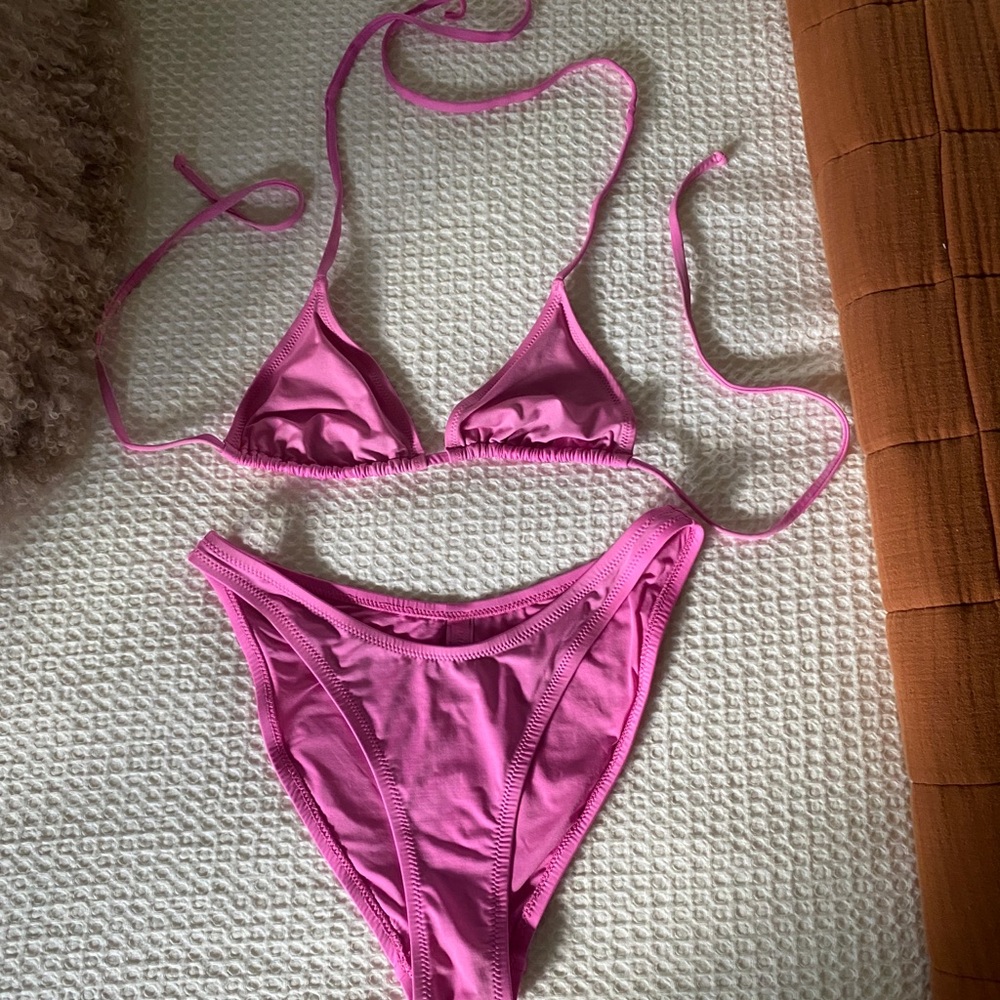 Skims Pink Bikini in the color Taffy